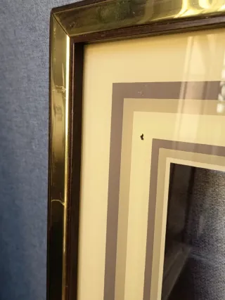 Marco de cristal dorado con paspartú