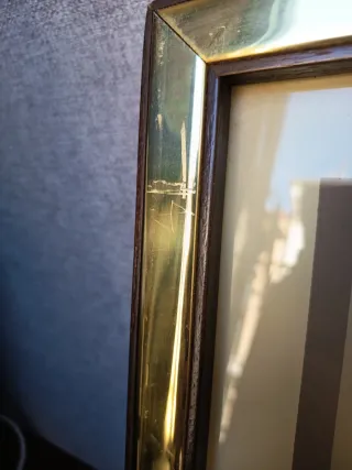 Marco de cristal dorado con paspartú