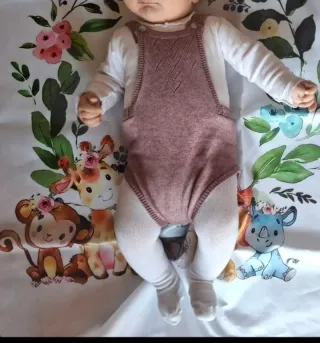 Peto de bebé de punto rosa