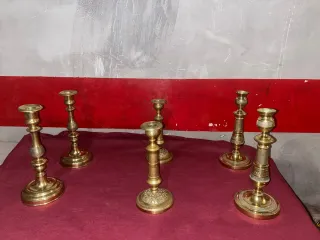 Juego de 6 candelabros de bronce