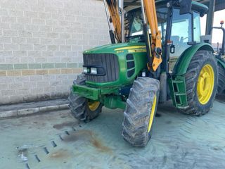 Tractor John Deere 6115D con pala