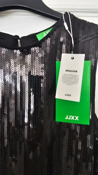 Top lentejuelas y flecos negro