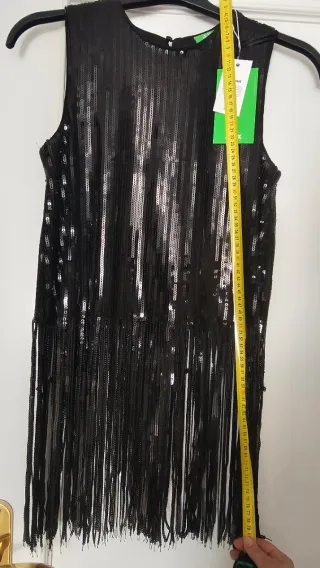 Top lentejuelas y flecos negro