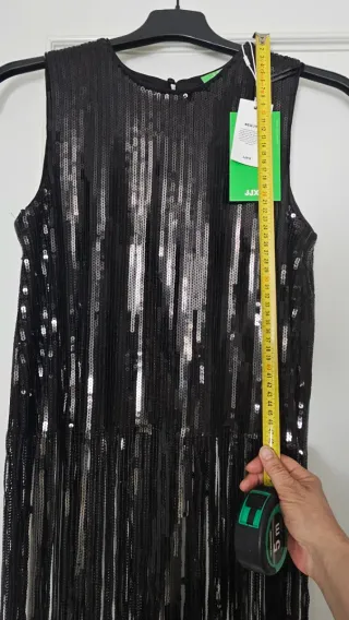 Top lentejuelas y flecos negro