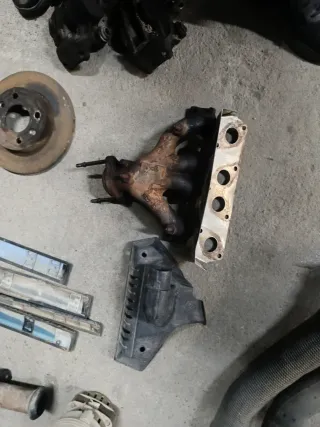 Colector de escape y protector Renault 19