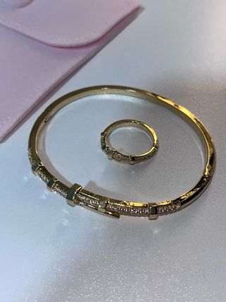 Pulsera y Anillo Dorado tipo clavo