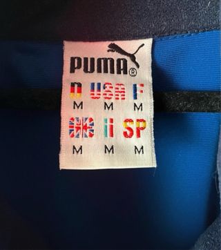 Chaqueta deportiva Puma azul y negra