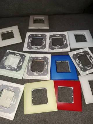 Lote 13 Marcos de interruptores Simon 27