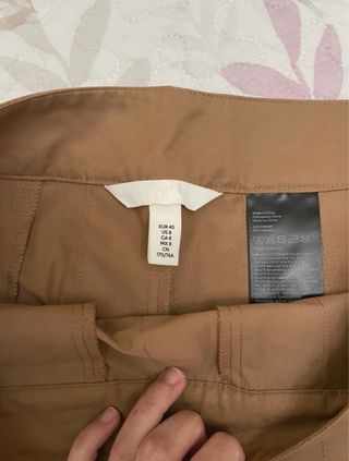 Falda de tablas H&M mostaza.