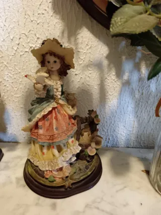 Reloj de sobremesa con figuras de ciervos