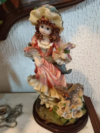 Reloj de sobremesa con figuras de ciervos