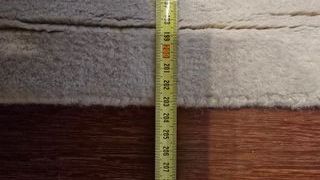 Alfombra beige textil