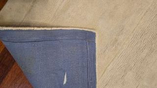 Alfombra beige textil