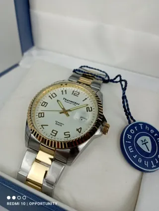 Reloj Thermidor Perpetual Time Oro y Plata