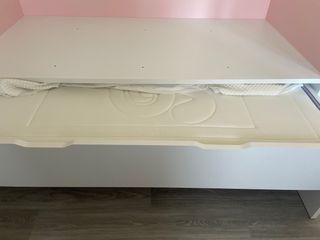 Cama nido blanca y rosa