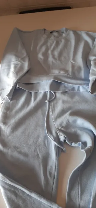 Tuta con pantalaccio celeste