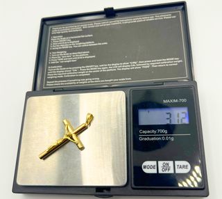 Cruz de Oro 18k 3.12 gr.