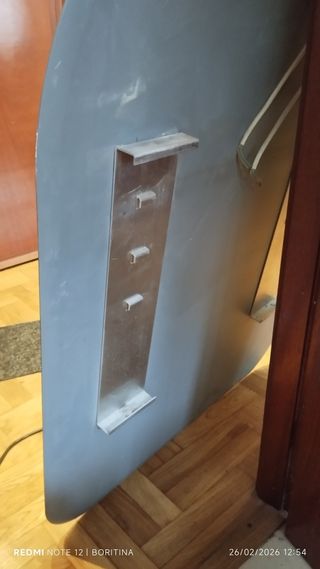 Espejo ovalado con luces doradas