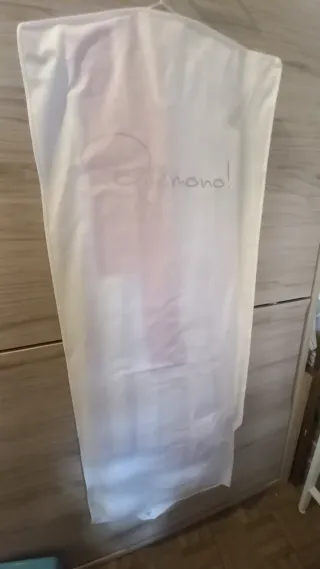 Vestido de comunión blanco con lazo rosa