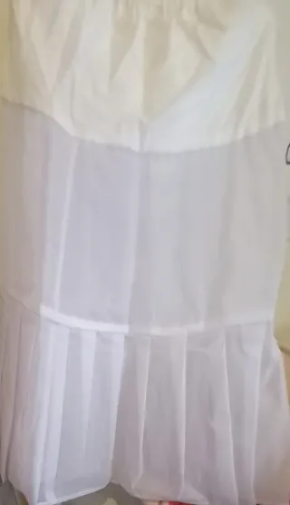 Vestido de comunión blanco con lazo rosa