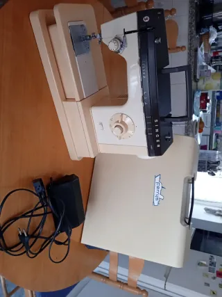 Máquina de coser SINGER M.7184
