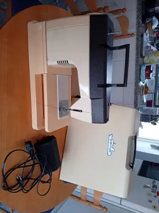 Máquina de coser SINGER M.7184