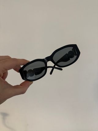 Occhiali da sole unisex neri e oro stile vintage