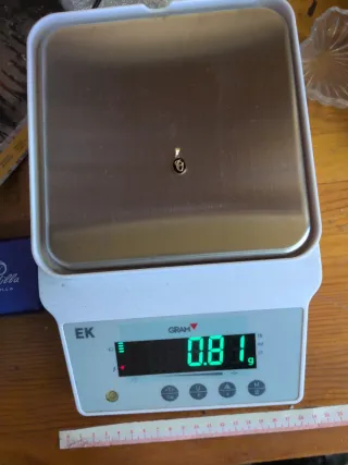 Colgante Letra Oro 18k y Ónix