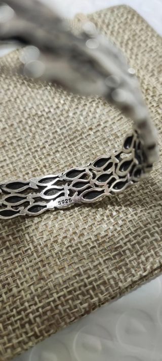Pulsera de plata con diseño de peces