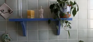 Mobile bagno blu con piano in marmo