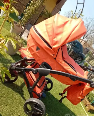 Carrozzina e passeggino Junama arancione