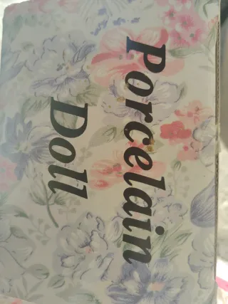 Muñeca porcelana cara Doll flores