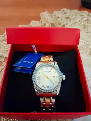 Reloj Skyline Mujer Oro y Plata