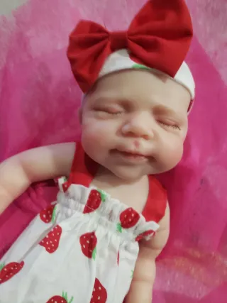 Bambola neonata Reborn e lettino