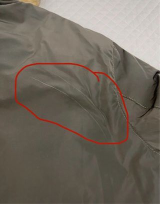 Abrigo Zara verde militar con capucha