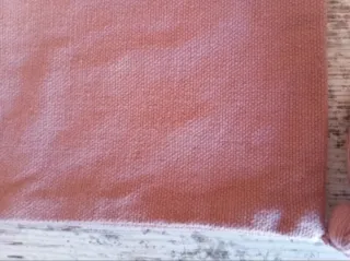 Funda de cojín rosa con borlas