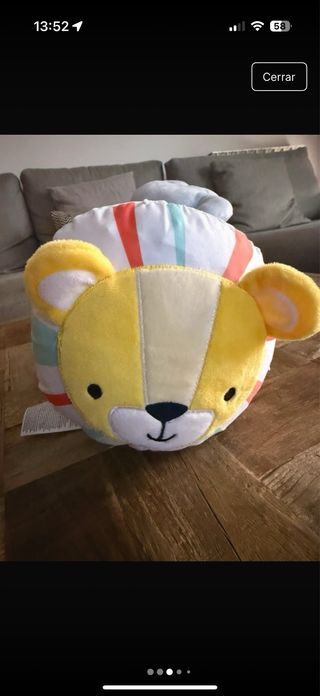 Cojín de actividades para bebé con juguetes