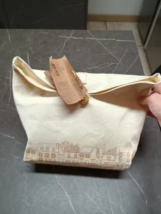 Pochette beige e oro con stampa città