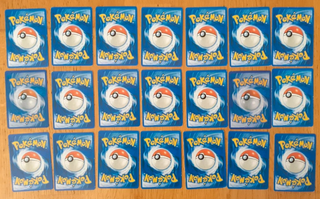 Caja metálica pokemon Sun & Moon con 49 cartas