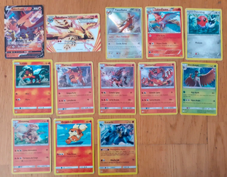 Caja metálica pokemon Sun & Moon con 49 cartas