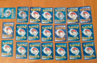 Caja metálica pokemon Sun & Moon con 49 cartas