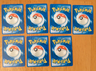 Caja metálica pokemon Sun & Moon con 49 cartas