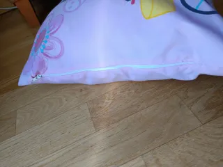 Cojín con relleno Peppa Pig con bicicleta