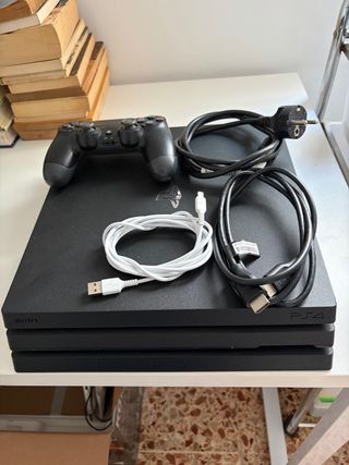 Consola PS4 Pro Negra + Accesorios y 7 juegos