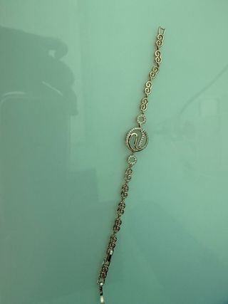 Pulsera dorada y plateada con adornos ajustable