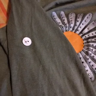 Blusa verde con stampa floreale