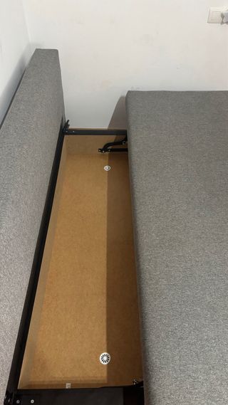 Sofá cama gris de tela