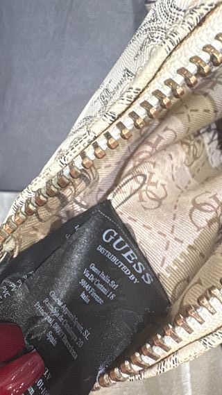 Borsa Guess bianca con strisce rosa e grigie