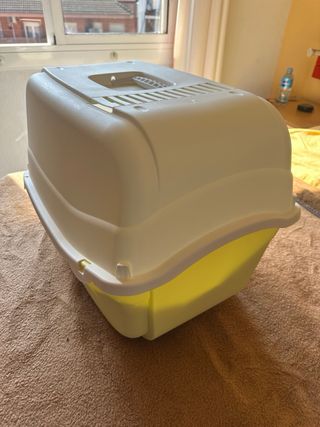 Arenero o caseta para mascotas