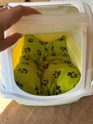 Arenero o caseta para mascotas